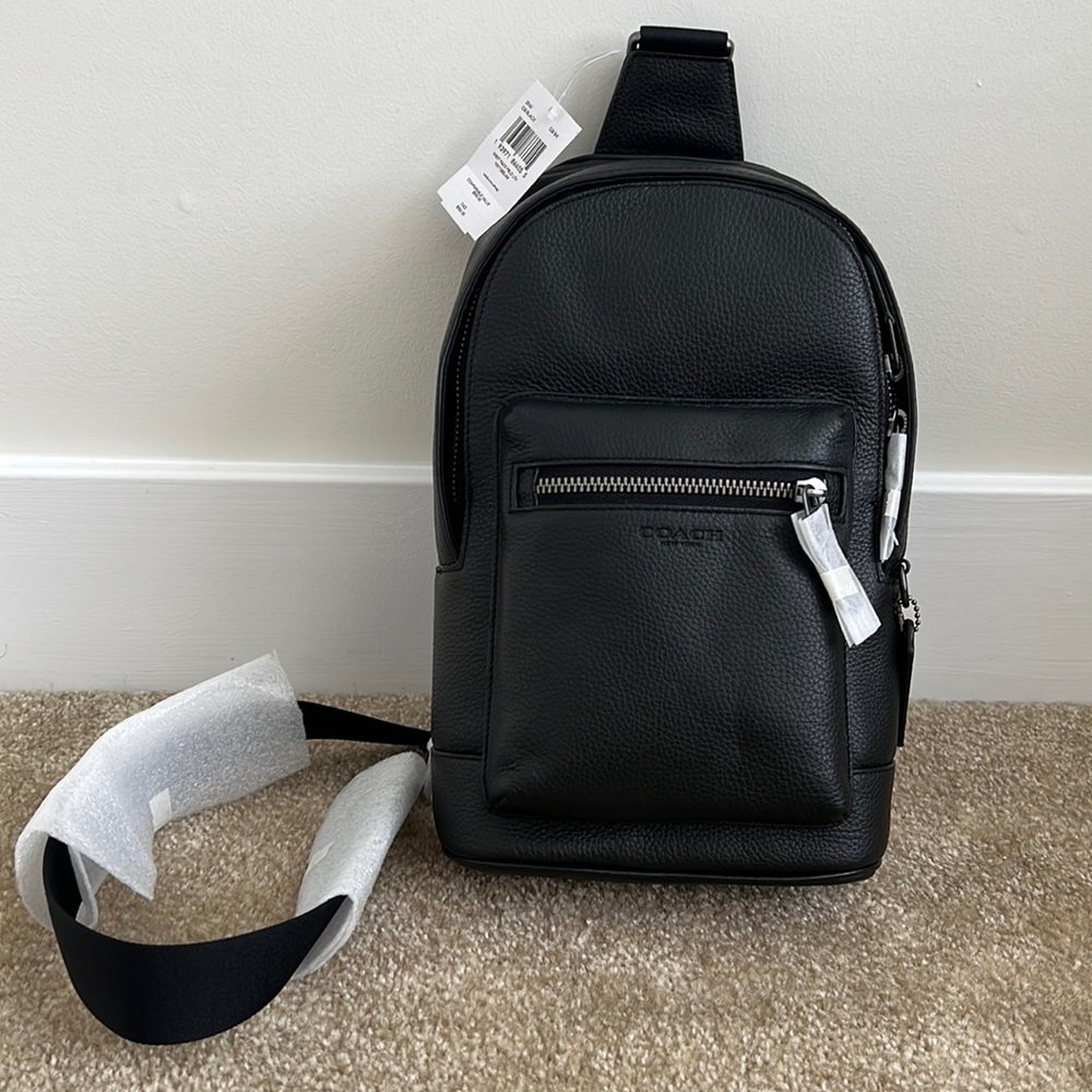 Small black Coach book bag. Brand New!